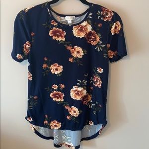 Navy blue floral shirt, with lace up back.